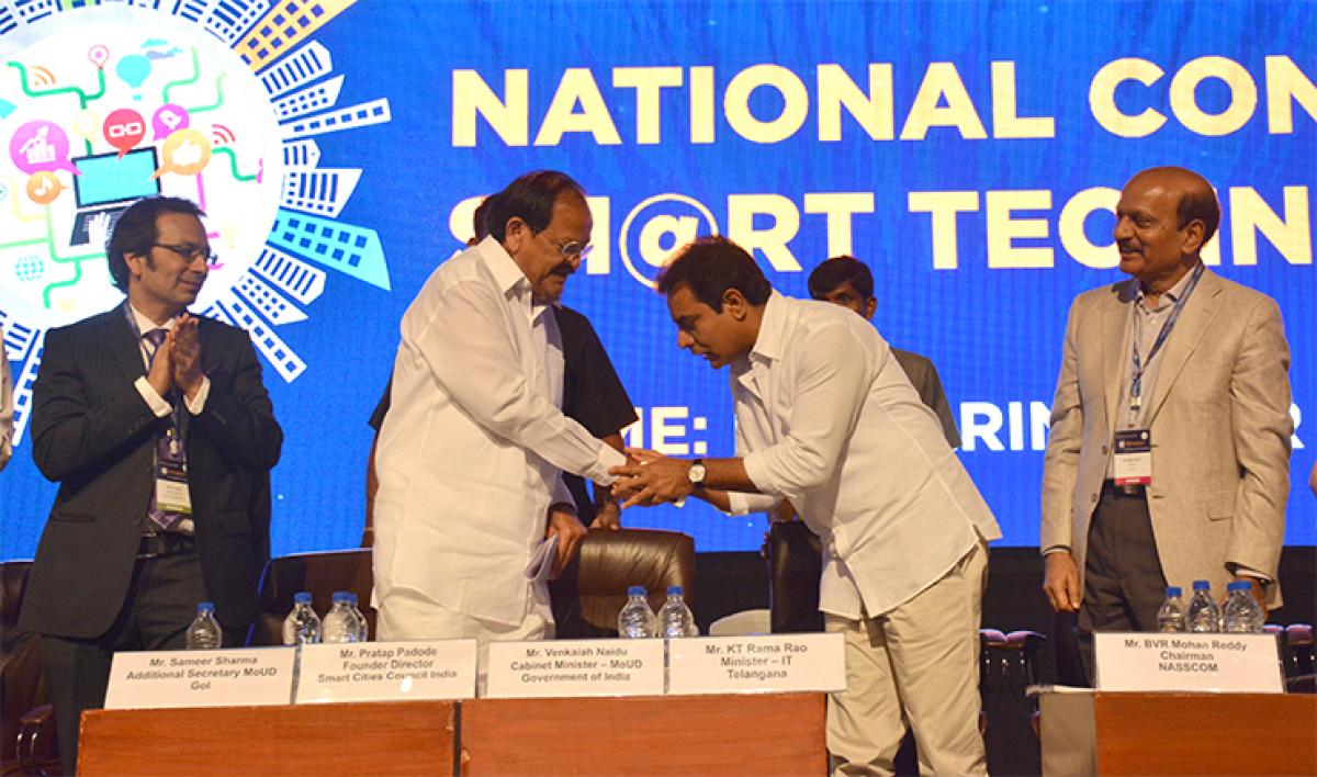 Union Minister M Venkaiah Naidu being greeted by IT Minister K T Rama Rao at the National Conclave on Smart Technologies at Madhapur in Hyderabad on Saturday. 